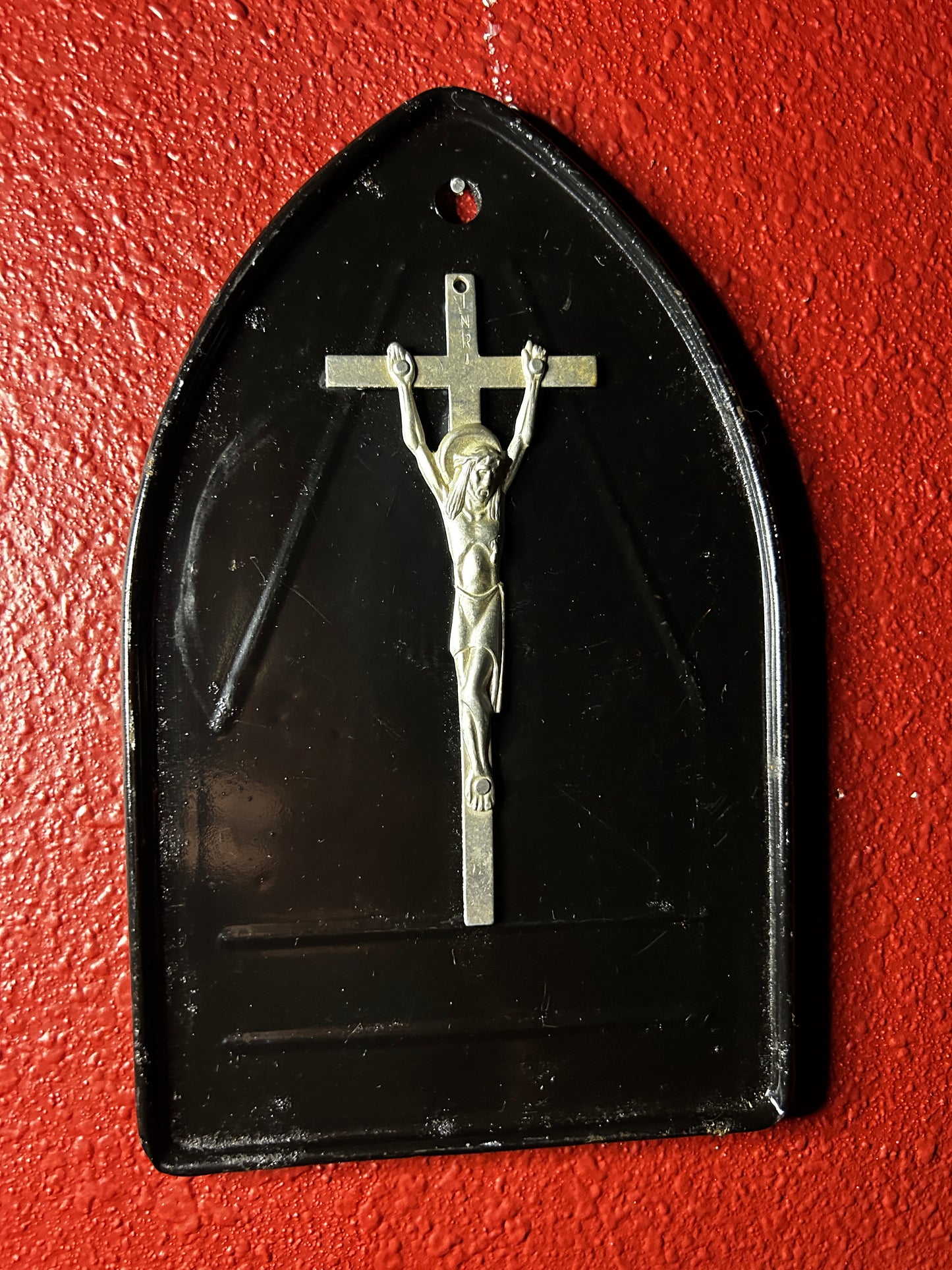 Crucifix on an Iron Rest