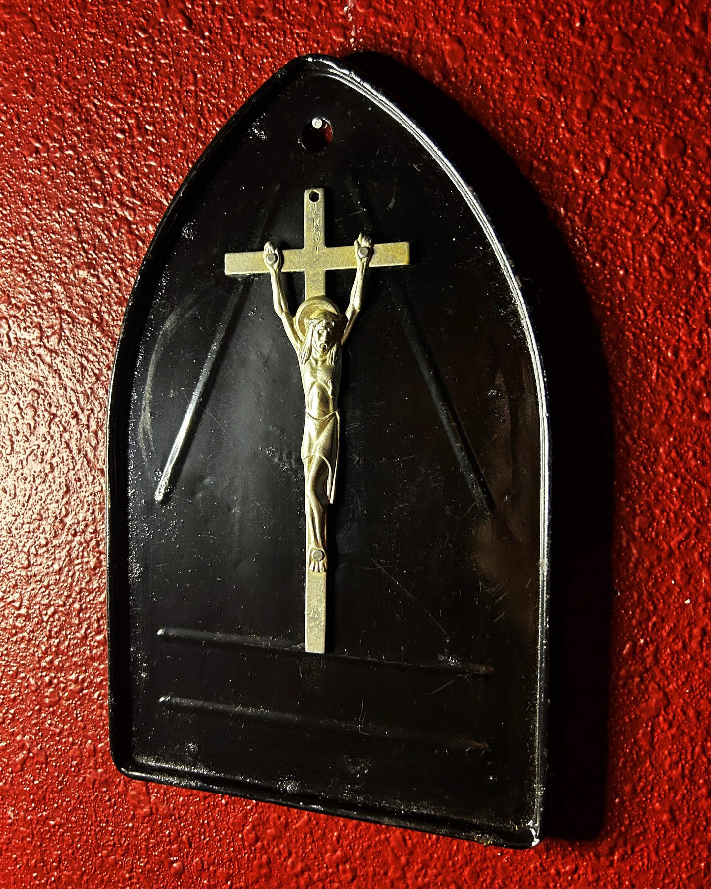 Crucifix on an Iron Rest