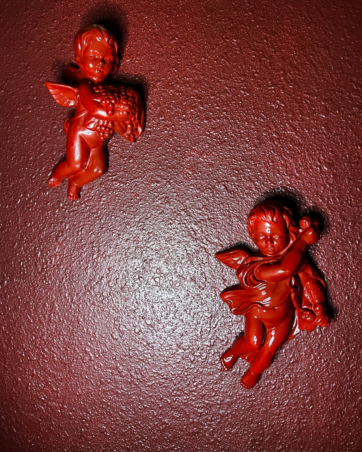 Pair of Red Cherubs