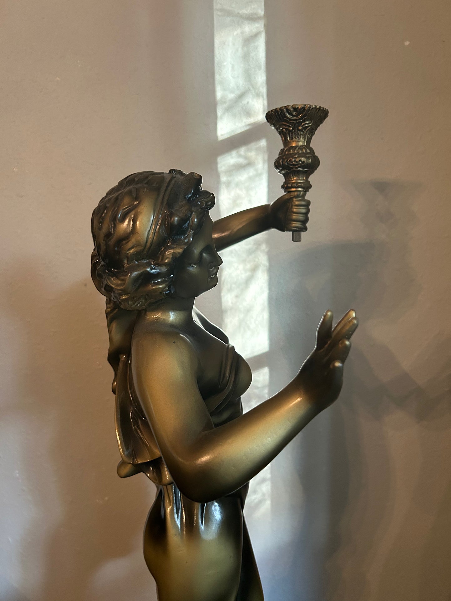 Large Statue of a Woman with Candleholder