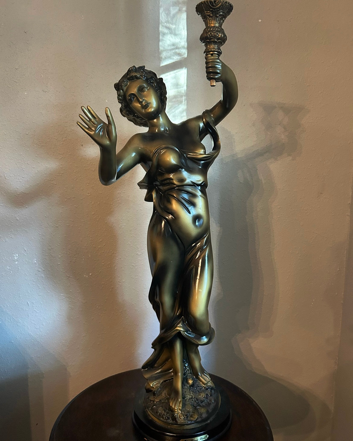 Large Statue of a Woman with Candleholder