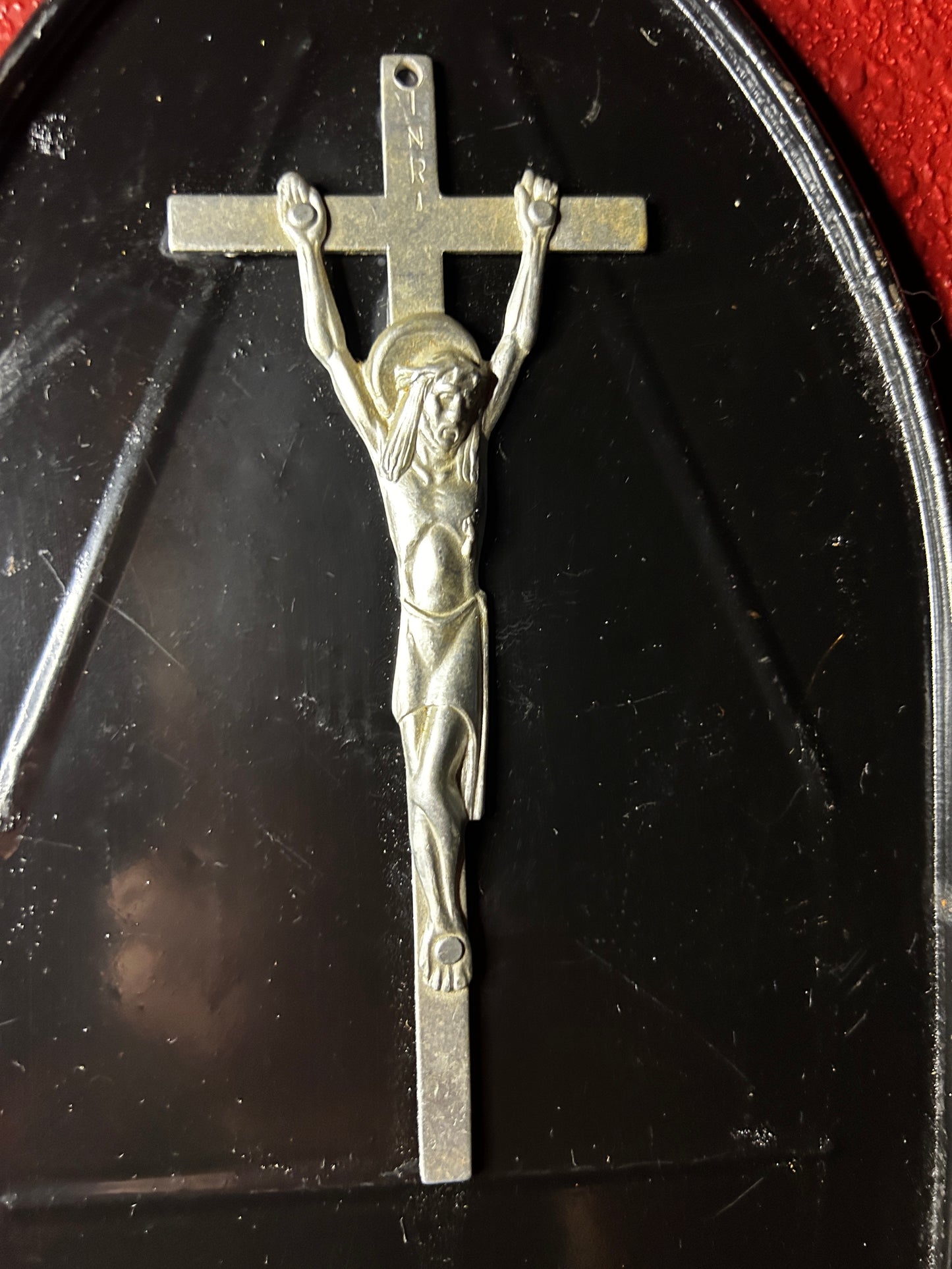 Crucifix on an Iron Rest