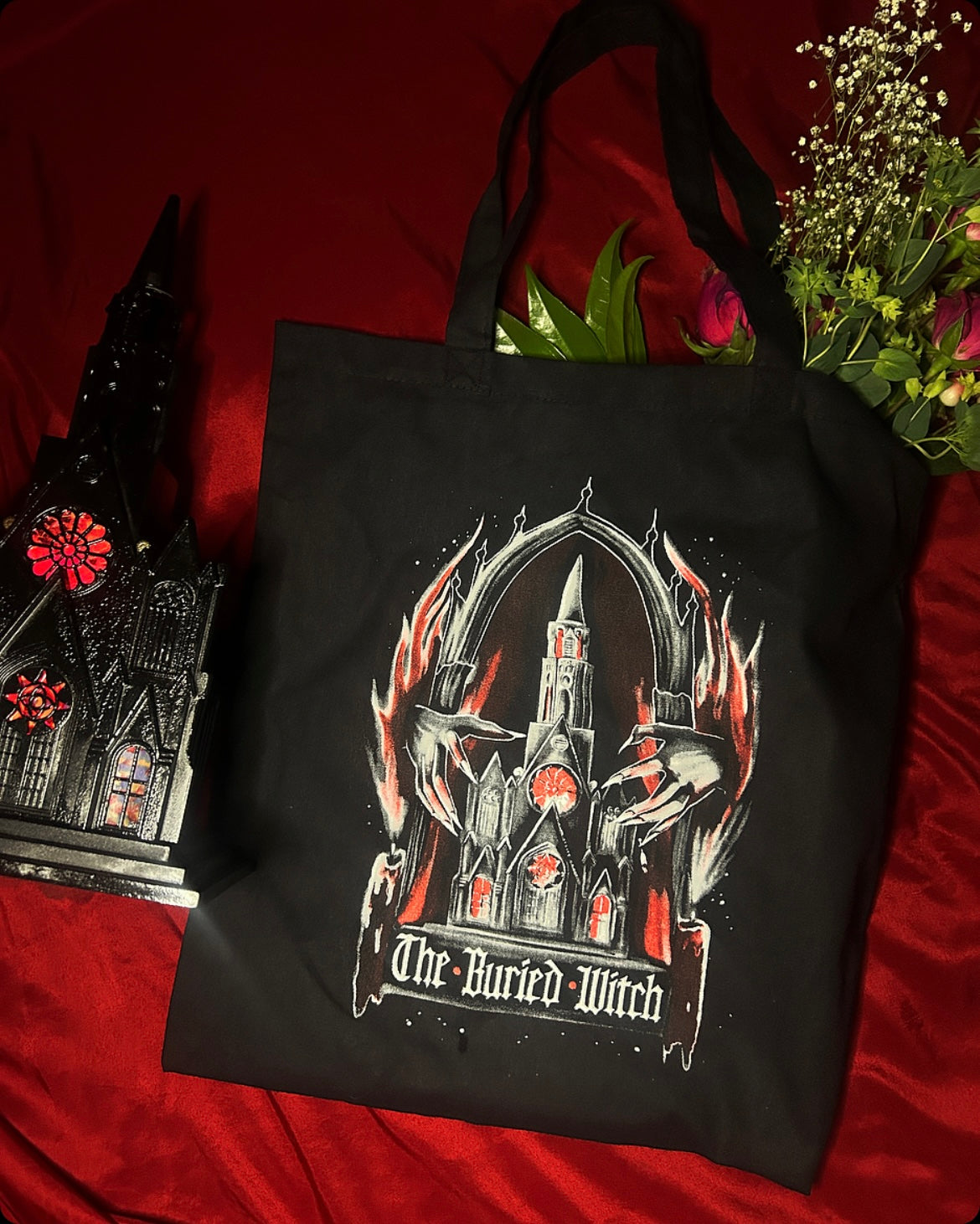 OFFICIAL 𝕿𝖍𝖊 𝕭𝖚𝖗𝖎𝖊𝖉 𝖂𝖎𝖙𝖈𝖍 Tote Bags